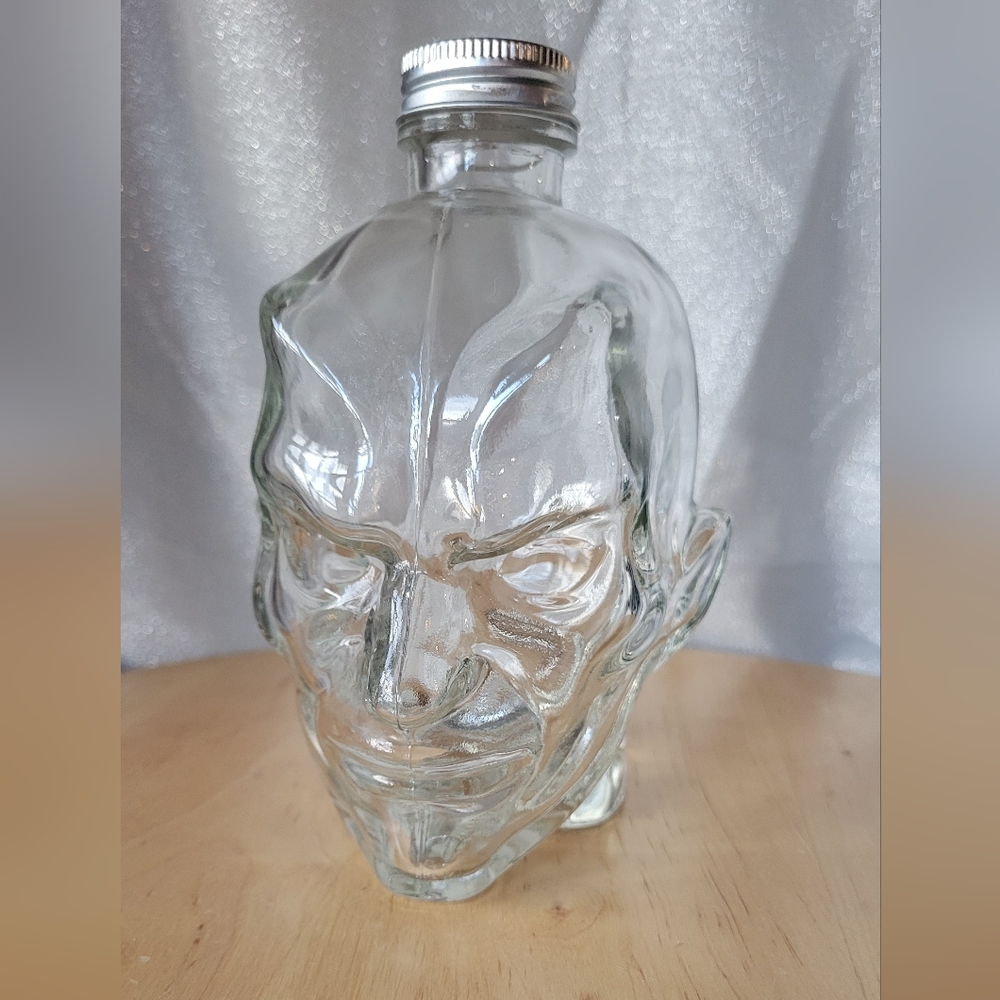 Clear Collectible Glass Mischievous Face Head Bottle With Lid